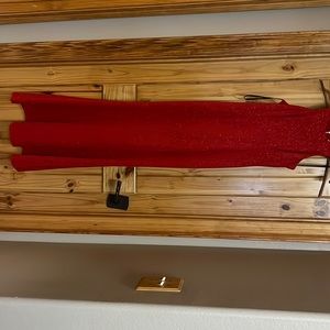 IS A SIZE 7, red high neck sparkly dress, worn once, brand is xtraordinary